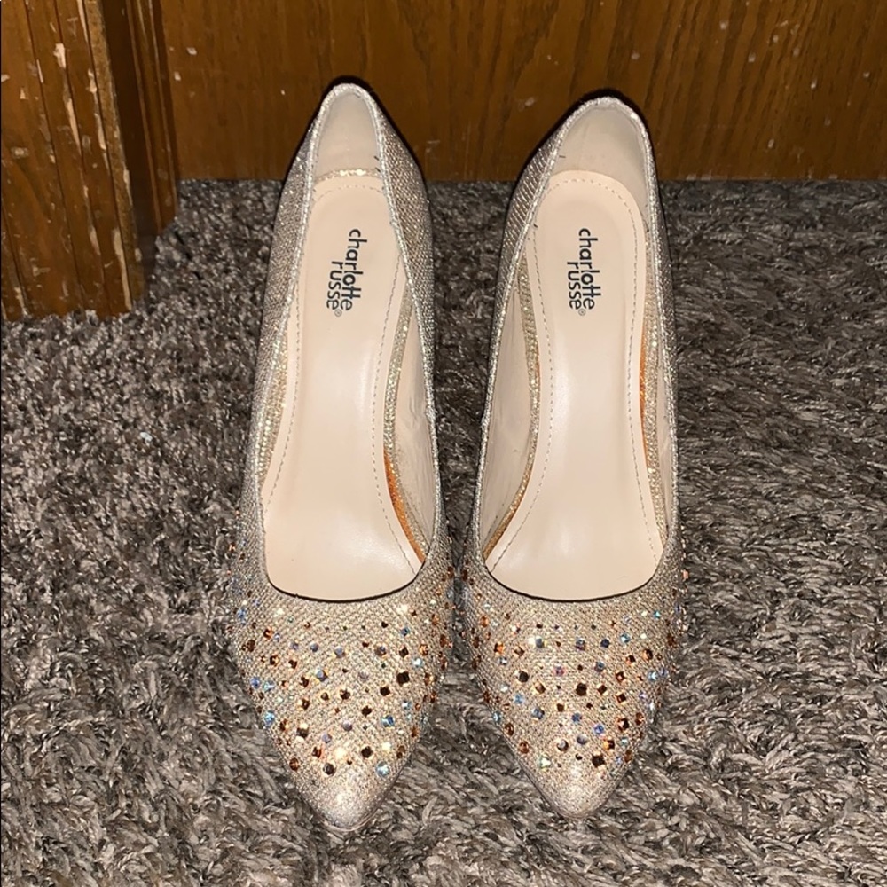 Gold close toe high heels.